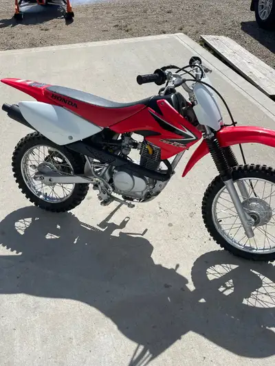 Honda crf80f dirt bike. Barely used, mint condition other than a scuff on fender. $2900 call or text...
