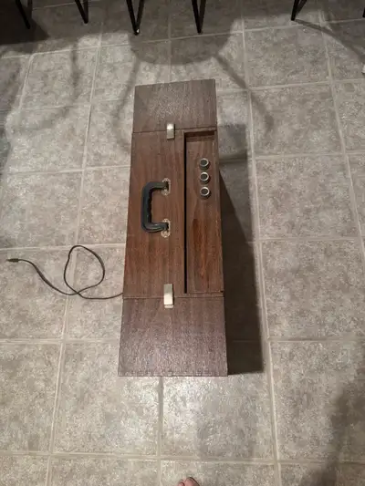 Older record player in Good Condition with detachable speakers plays perfect . Not sure of make . Ma...