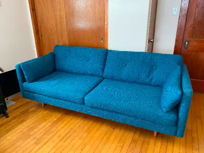 Selling lovely blue sofa from Article. Purchased in 2020 and is in excellent condition and recently...
