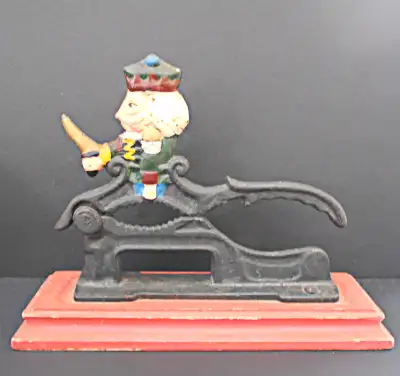 Toy Soldier Nutcracker Cast Iron Hand Painted on Wood Base, View more