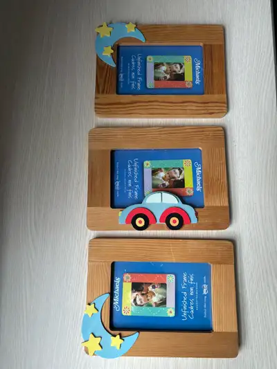 These three charming Michaels unfinished wooden picture frames are in good used condition and ready...