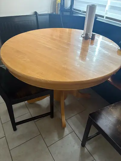Round table. Had an extension. 42”W 30”high Needs a coating on top.