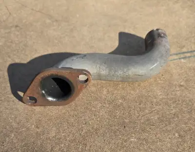 Tecumseh Lawn Tractor Exhaust Manifold in E.U.C., View more