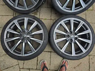 LEXUS IS Rims staggered set. Has curb rash but no bends or cracks. As is condition. Tires are shot