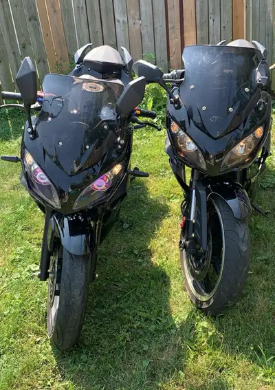 This motorcycle is a sleek, pre-owned machine ready to hit the road, featuring a powerful engine and...