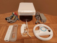 Nintendo wii console with cables, two good games,  no sensor