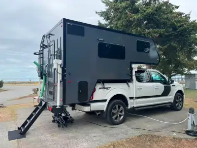Nearly new 2026 Mini172 hard-side truck camper, used for approximately one month. Fully loaded with...