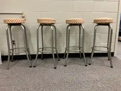 Industrial/Retro Bar Stools 4 - chrome-finished metal frame bar stools with a circular footrest and...