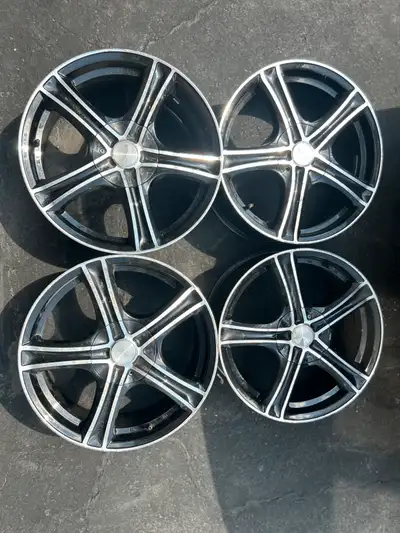 4 rims RTX Black allox 17”x7” Bolt patterns: 4 bolt x 114.3 mm AND 4 bolt x 100 mm Center bore size:...