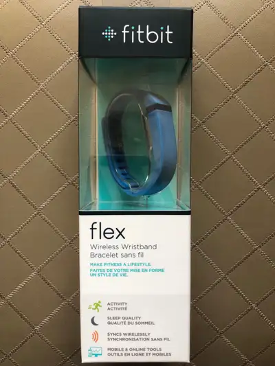 Stay on top of your health and fitness goals with the Fitbit Flex, a sleek and simple activity track...