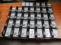 NEC SL1100 Phone System with 8 phones
