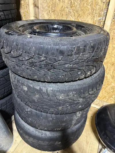 Rims are in good condition, tires are quite worn.