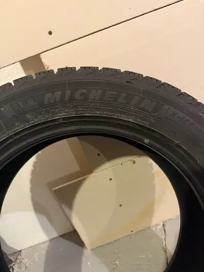 Brand new Michelin x -ice snow Not even 50 km on them . Bought last year and was stored inside .