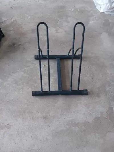 Bike stand floor in good condition. Supports 2 bikes