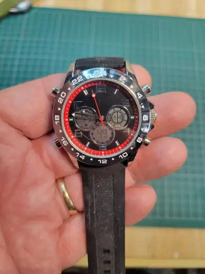 Men's analog / digital watch in like new condition, View more