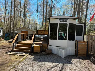 Beautiful 2022 Forest River Wildwood Model # 353FLFB destination trailer located in a small, well-ma...