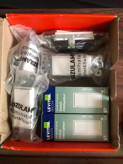 LOT - Leviton Decora Switches and Sozulamp Illuminated Outlet  S, View more