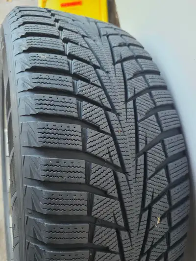 Hanook Winter tires on factory MDX Alloy Rims. Tires have less than 2,000km of wear, like new condit...