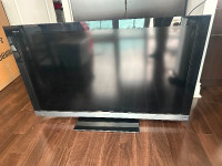 Sony Bravia 46” LCD TV with swivel stand and remote