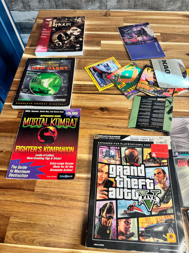 older pc games and book collections in Other in Ottawa - Image 4