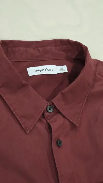 Calvin Klein men's long sleeve dress shirt in maroon size large. Only worn a couple of times. Pickup...