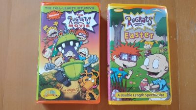 1998 The Rugrats Movie VHS – Orange Tape in Orange Clamshell 2002 Rugrats Easter VHS – a double leng...