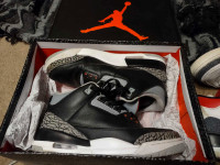 Jordan 3s two pair's . Black cement has box. White pair no box.