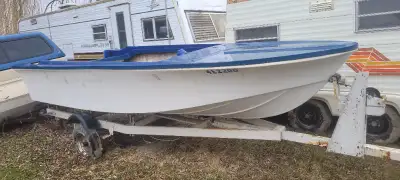 15 foot project boat. No holes . Needs interior and motor. The trailer in the picture is sold. $50 o...