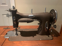 Sewing machine with table 