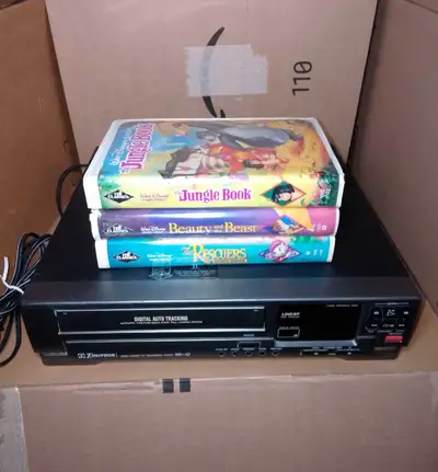 Emerson VHS Player with 3 Black Diamond Disney Movies, View more