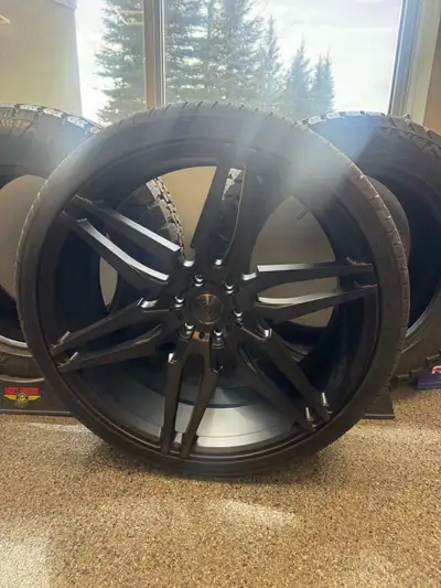 26 inch Dub wheels with 305 30 26 tires. Never used, stickers are still on tires. No markings on rim...