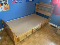 Wooden captain’s bed and matching dresser