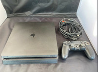PS4 slim + controller and games