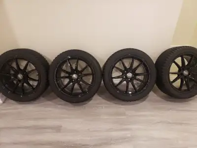 SOLD - $785 - 18 Inch Winter Tires (XL Kumho Wintercraft ice 131 - 245/40R/18) on Black Alloy Rims (...