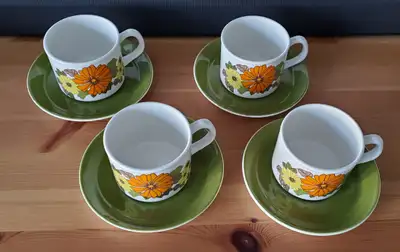 Vintage groovy "flower power" design popular in the 1970s. Set of 4 stoneware teacup and saucer by H...