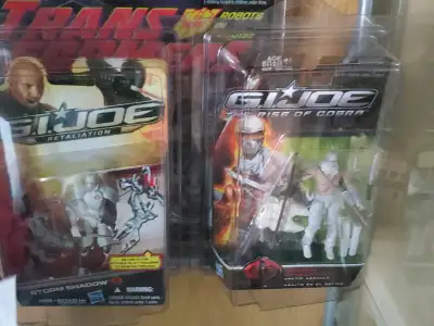 Both sealed.sold as set $70 firm Gi joe 25th anniversary Transformers