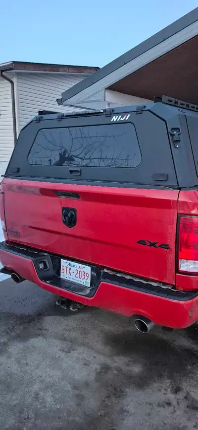 Ninja Truck Topper fits 5'7" box. Bought new in April 2025 for $3100. Selling $2000 firm. Has 2 slid...