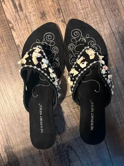 Never worn, black slide sandals embellished with pearl colored seashells. Excellent condition, Smoke...