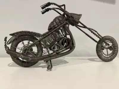 HANDCRAFTED CUSTOM STEEL COILED CHOPPER, View more