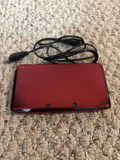 Modded red Nintendo 3ds with charger, View more