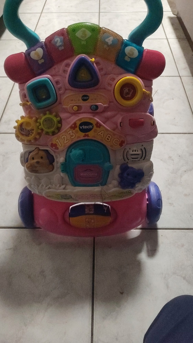 VTech stroll and discover sit to stand learning activity walker  in Toys in City of Toronto