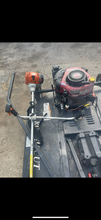 Rough cut mower with rough cut trimmer 