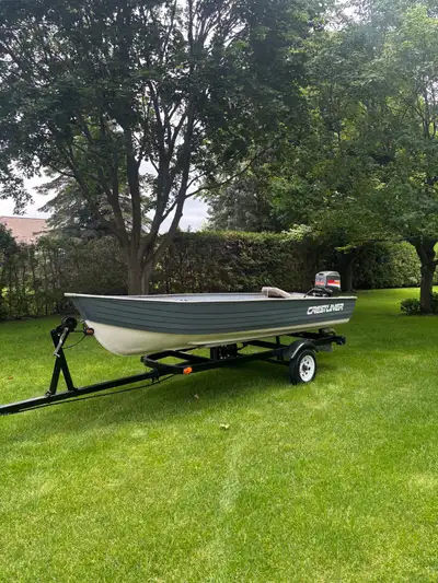 4.5 ft Crestliner aluminum boat with a 30HP Mariner outboard and trailer with ownership. Boat has be...