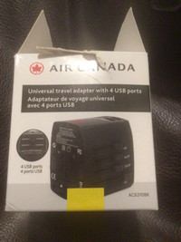 Travellers New Air Canada Universal Adapter with 4 USB Ports