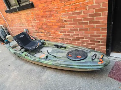 The kayak is a pelican premium catch 120, 12 ft kayak with 4 rod holders. It is a stand in, top wate...