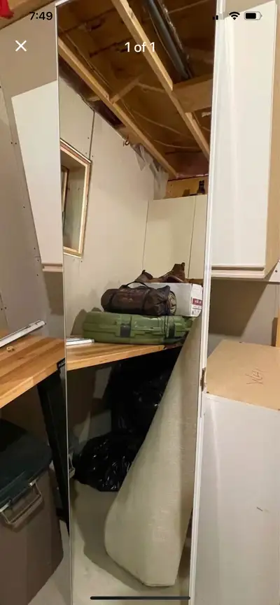 Mirrored bifold closet door appx 78” tall by 35” wide. Came off single closet in bedroom. Free.