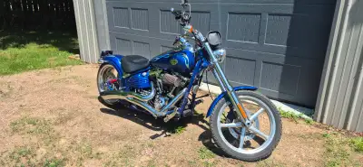 Harley Davidson Rocker C. Custom bags, Vance Hines exhaust, fuel pack. Comes with orignal exhaust.