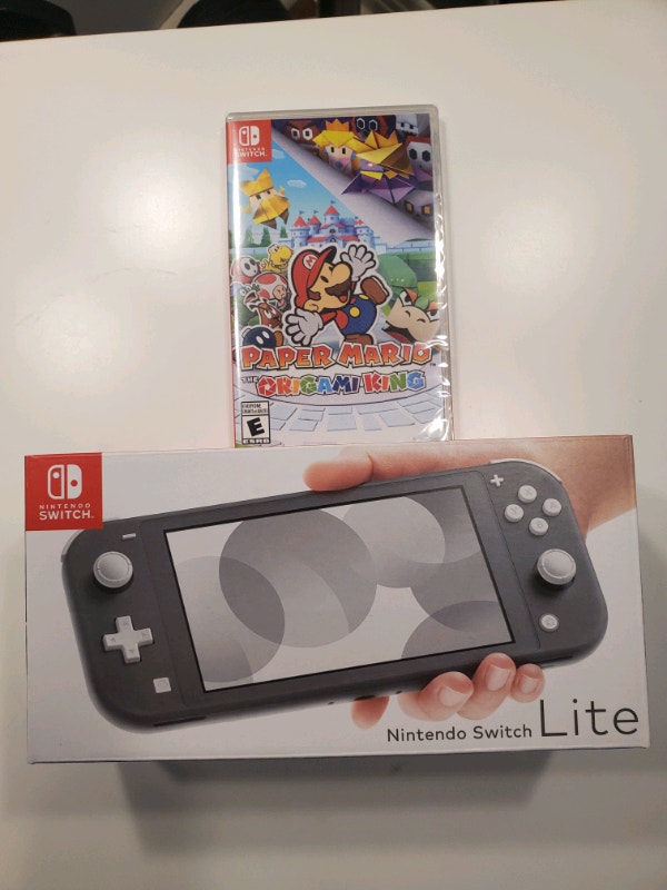 Nintendo Switch Lite NEW + jeu Mario Game Facture 1 an Garantie La