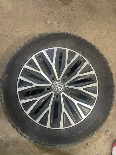 I'm offering a set of 16-inch original VW Jetta wheels, complete with winter tires, sized at 205/60R...