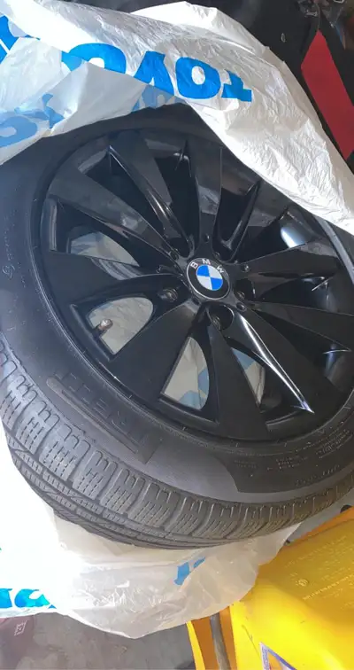 225/45/18 RFT on OEM BMW RIMS One is original black One is powder coated black with a small curb ras...
